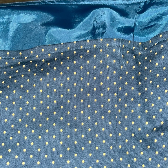 Strapless Dress is lined inside. It is a blue/dk green color w/ gold polkadots - Picture 4 of 4